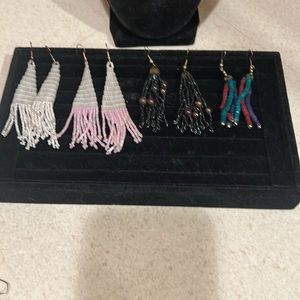 Set a four dangling earrings sold together